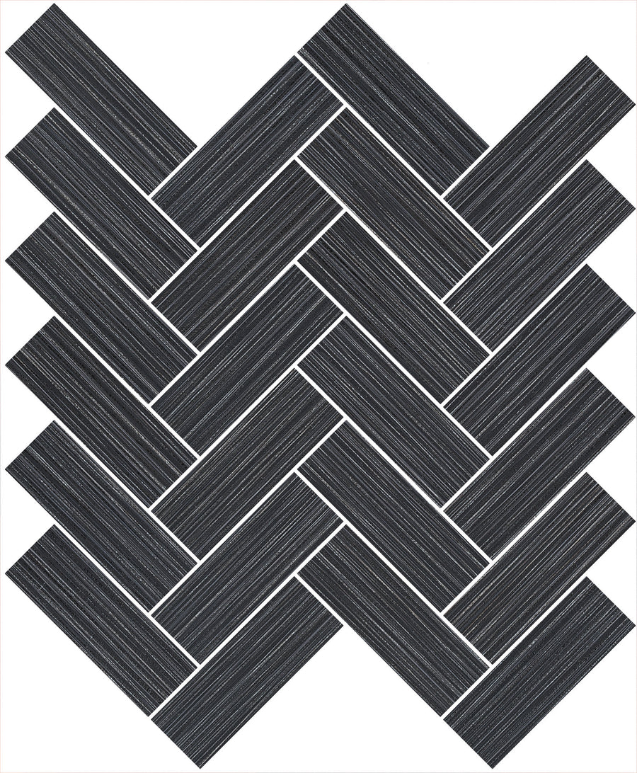 Linea 1" x 4" Herringbone Mosaic Tile in Shadow features rectangular black tiles with thin white stripes, arranged diagonally—perfect for a bold bathroom or kitchen backsplash design.