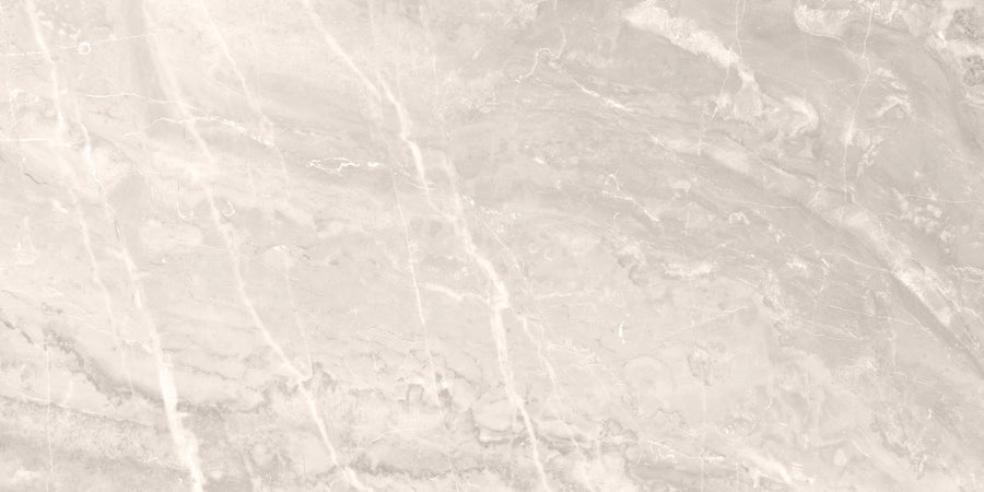 The Veil 12" x 24" Mystic Tile in White Polished offers a smooth, elegant stone look with subtle veining—perfect for flooring or countertops.