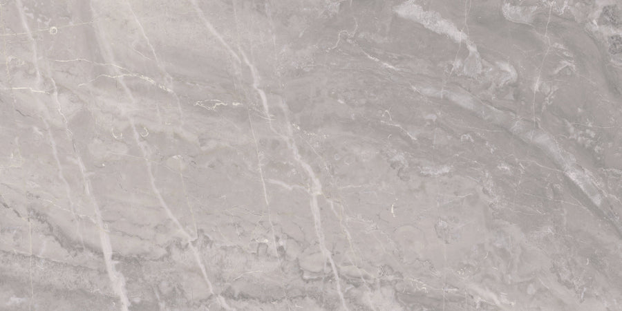 Veil 12" x 24" Mystic Tile in Mystic Natural features a light gray marble look with subtle white and dark veining, polished texture, and smooth natural patterns—perfect for spa-inspired bathrooms or luxury, sophisticated spaces.