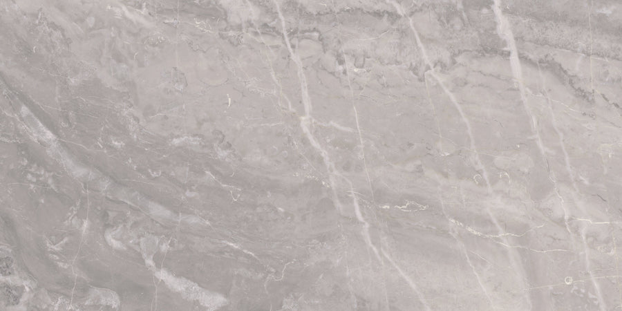 Veil 12" x 24" Mystic Tile features a Mystic Polished finish with subtle white and tan veins on a light gray surface, creating an elegant stone look. Smooth texture and soft shading enhance its refined appearance.