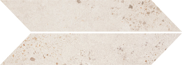 Two Strata Chevron Tiles in Lava White, each parallelogram-shaped with a terrazzo pattern, are placed horizontally to form a right-pointing chevron arrow.