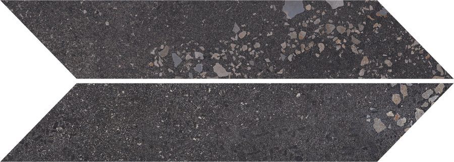 Two long Strata Chevron Tiles in Ember, featuring a speckled, stone-like texture with lighter gray accents, are arranged to form a right-pointing arrow—a bold geometric tile that's both stylish and durable.