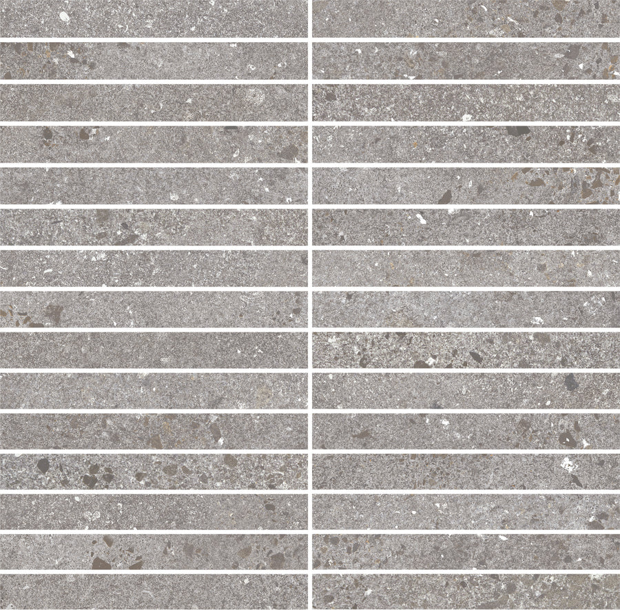 The Strata Kit Kat Mosaic Tile in Cinder features gray rectangular tiles with a speckled stone texture, arranged horizontally with thin white grout lines and a vertical grout line that creates a subtle striped pattern.