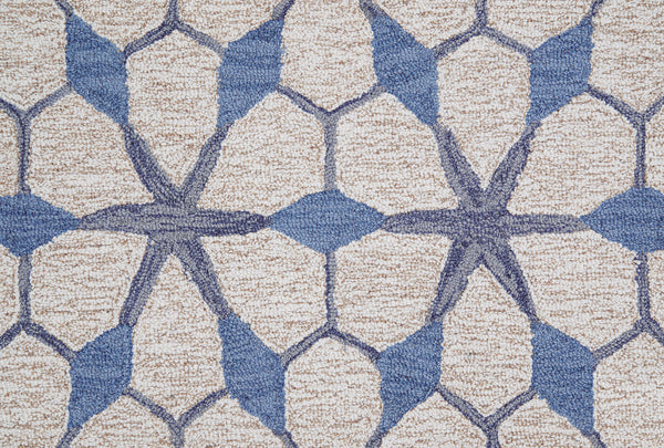 A close-up of the Yakima Berber Carpet in blue highlights its textured, geometric pattern—ideal as a durable option for premium flooring.