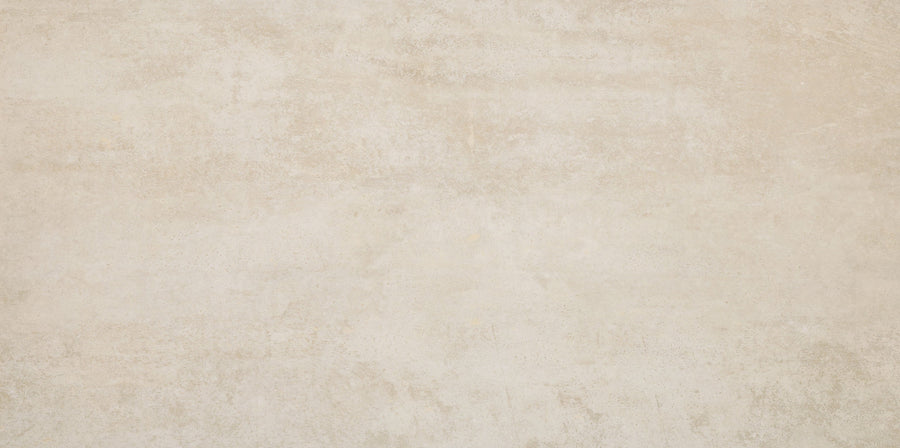 Hans.A Rectified 24" x 48" Tile in Light features a textured, plaster-like surface with subtle tonal variations and faint speckles. Its neutral look is ideal for seamless large-format installations, creating an unadorned, modern finish.