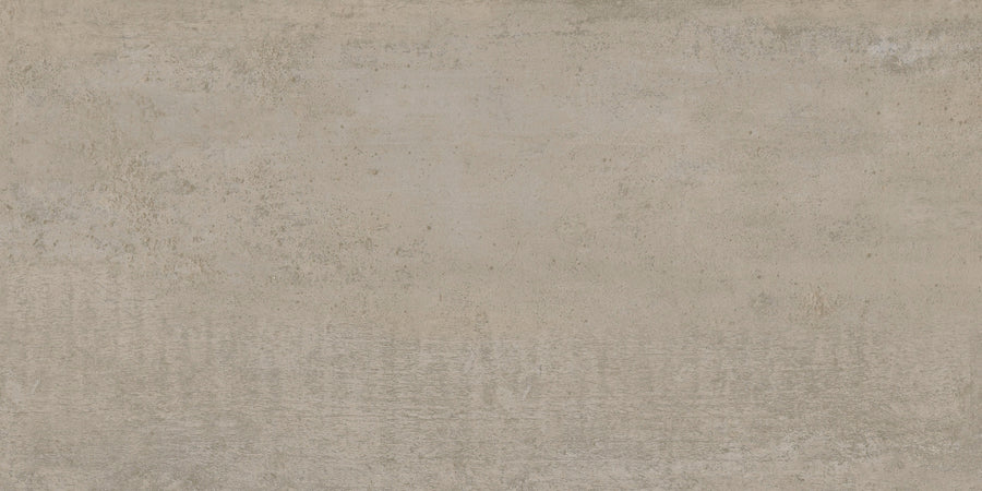 A close-up view of the Hans.A Rectified 12" x 24" Tile in Dark color, showcasing its rough texture and subtle stains for a modern, industrial look and seamless installation.