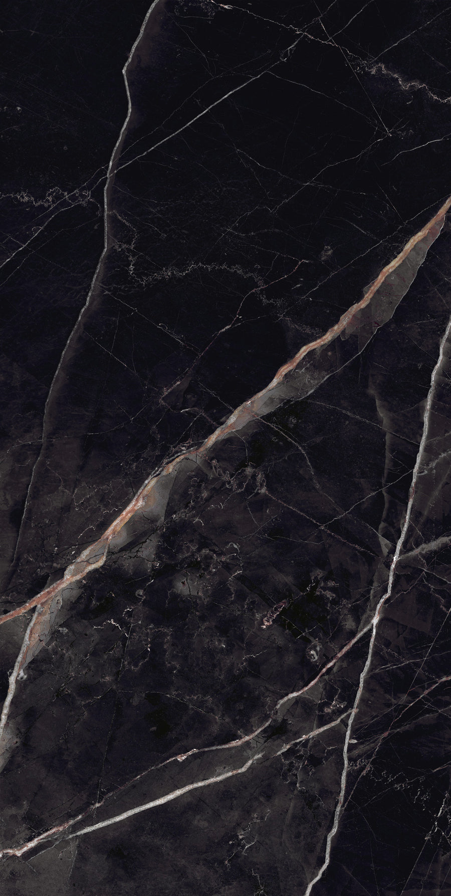 Dark marble surface with white and light brown veins running diagonally across the image, creating a natural, textured stone pattern.