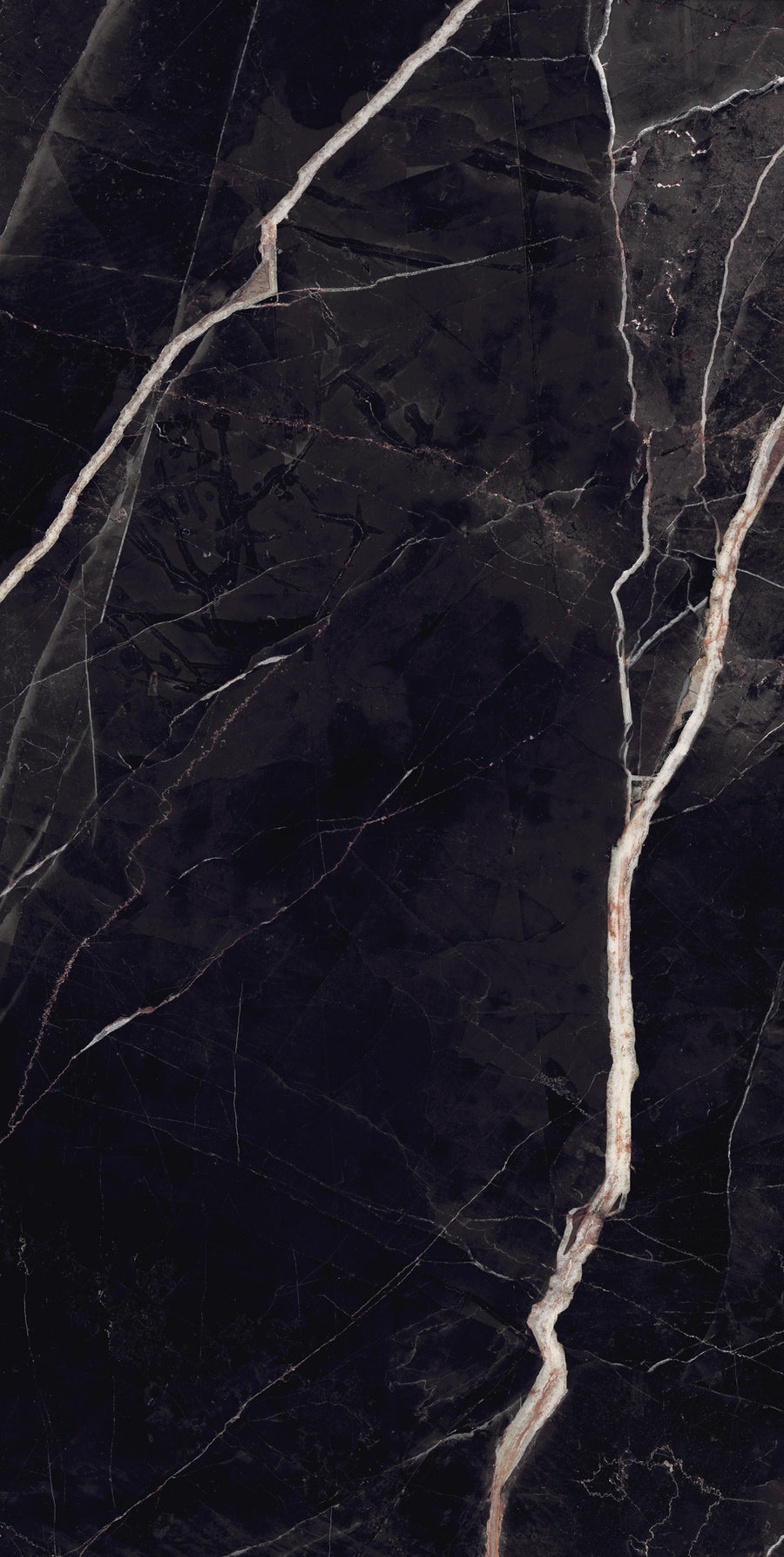 A slab of polished black marble with prominent white and light brown veining running diagonally, creating a striking and elegant pattern against the dark background.