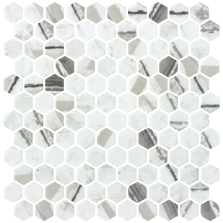 Aragon Hills Hexagon Glass Mosaic Tile in Joy Dynasty features a striking geometric pattern. The tiles showcase shades with streaks and marbled effects, adding textured visual interest to any space.