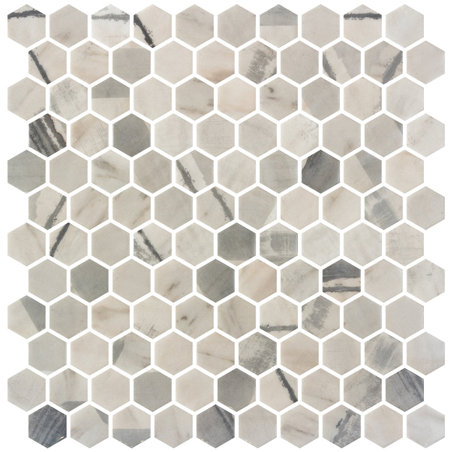 Aragon Hills Hexagon Glass Mosaic Tile in Python Haze features a honeycomb geometric pattern, showcasing light beige, gray, and white tones with darker streaks and marbling on each tile.