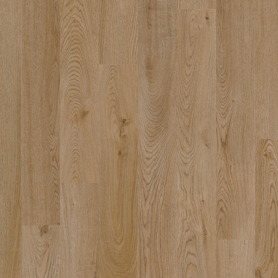 Close-up view of Coretec Originals Classics Vinyl flooring in light brown, featuring natural wood grain patterns and subtle knots that highlight the texture and color variation of each plank.
