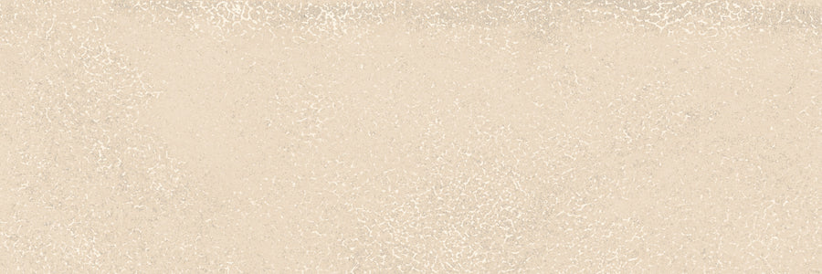 A textured beige surface with a speckled, grainy pattern resembling aged plaster, ideal for pairing with Avanti 4x12 Glazed Porcelain Tile to create a calming, cohesive look.