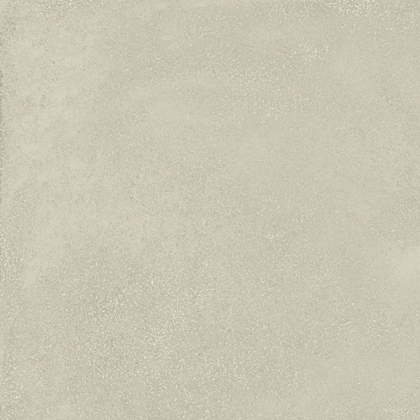 The Avanti 12x12 Glazed Porcelain Tile features a light gray, subtly mottled surface that mimics concrete or plaster, with fine speckling and gentle color variations for a calming, modern look.
