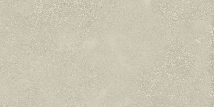 Avanti 12x24 Rectified Glazed Porcelain Tile features a light gray, textured surface with subtle shade variations and a speckled, concrete-like look—ideal for creating an elegant, calming aesthetic in any space.