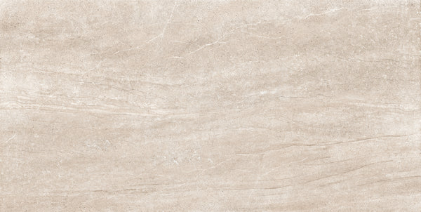 Rectangular sand-colored Santorini 12x24 Porcelain Tile with faint veining and a tactile elegance that highlights its stone-like texture.