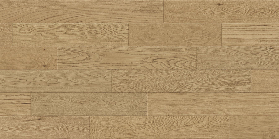 Dorchester White Oak 6 1/2" Hardwood features light brown, wide plank engineered flooring in a staggered layout with smooth surfaces that showcase the natural grain, textures, and knots of White Oak.