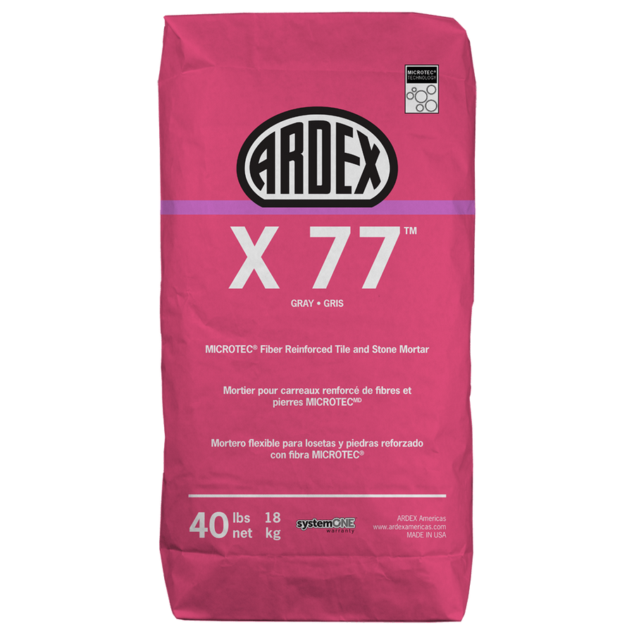 A 40-pound (18 kg) pink bag of Ardex X77 large format tile mortar with MICROTEC fiber reinforcement; this polymer-modified mortar features English and Spanish product details on the packaging.