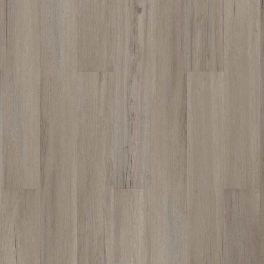 Coretec Originals Classics Vinyl features light brown luxury planks with natural grain patterns and subtle tone variations, arranged in a staggered layout. The smooth matte finish and durable rigid core ensure lasting quality.