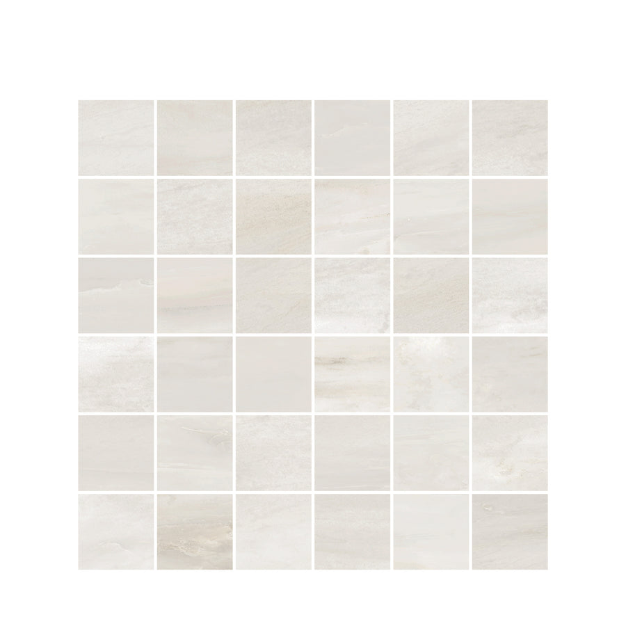 A grid of thirty-six Renaissance 2x2 Matte Porcelain Tiles in light beige, each with subtle marble-like veining, arranged 6x6 on a plain white background, highlighting their premium craftsmanship.