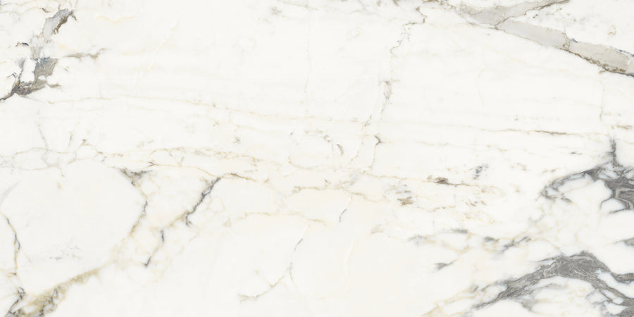 The Renaissance 12x24 Polished Porcelain Tile features a white marble look with soft gray and beige veining, a smooth texture, and natural, irregular patterns—ideal for modern countertops or flooring.