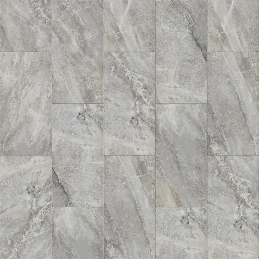 Coretec Plus Tile Luxury Vinyl Tile features gray marble tiles with subtle white veining in varied rectangles, arranged in a staggered pattern for a smooth, elegant, and polished tile-look design perfect for modern waterproof flooring.