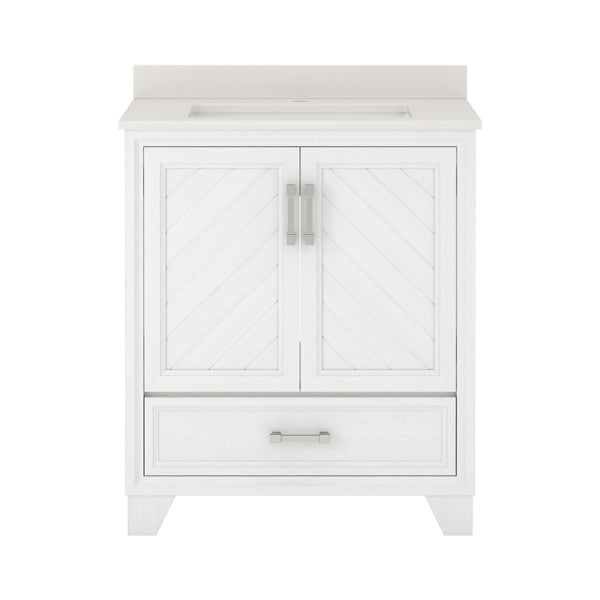 White bathroom vanity with two paneled doors featuring a chevron pattern, a rectangular drawer at the bottom, and silver handles. The countertop is smooth and integrated with a sink.