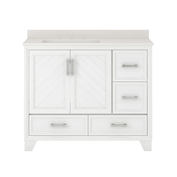 A white bathroom vanity with two central cabinet doors, three drawers on the right, and one large bottom drawer. The vanity has silver handles and a light-colored countertop.