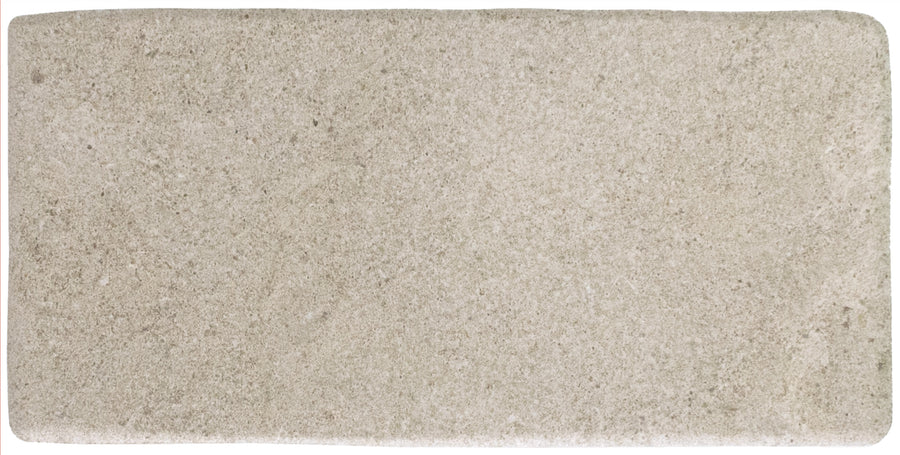 The Abbey Stone M 4.3" x 8.6" Ceramic Tile in Rila features a rectangular shape, light beige hue, rough textured surface, and gently rounded edges for a timeless stone look.
