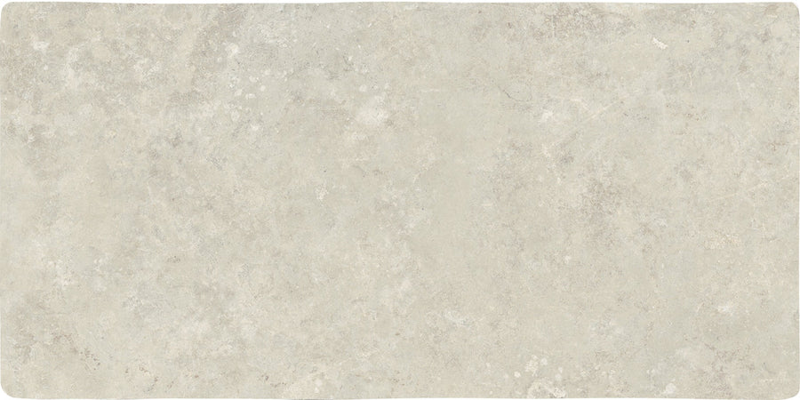 The Abbey Stone XL 8.6" x 17.2" Ceramic Tile in Sintra features a light gray, stone-inspired matte finish with subtle tonal variations—ideal for modern spaces seeking a refined, natural aesthetic.