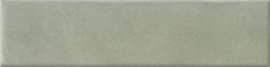The Abode 2.5x9.5 Porcelain Tile is a rectangular, light gray tile with a smooth matte finish, ideal for accent features or subtle linear patterns in modern interiors.