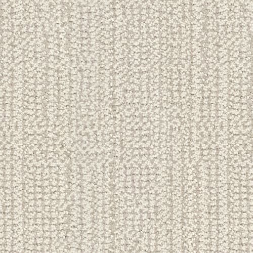 Close-up of the Occasion On Trend Carpet in Acclaim, showcasing a luxurious light beige hue and a subtle grid pattern created by tightly looped fibers.
