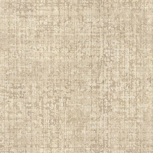 The Ithaca On Trend Carpet in Acropolis features a textured beige background with a subtle grid pattern and distressed markings, evoking the luxurious look and feel of high-end carpet fabric.