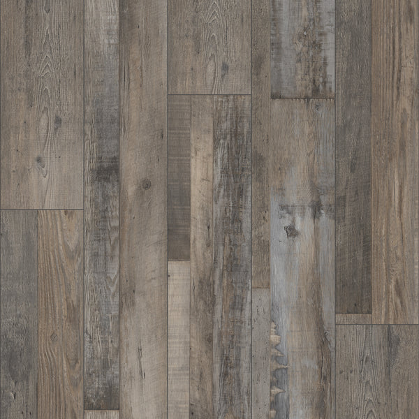 A close-up of Coretec Plus Enhanced Vinyl floorboards shows a blend of brown, grey, and weathered tones with realistic grain and natural textures—ideal for stylish, waterproof flooring.