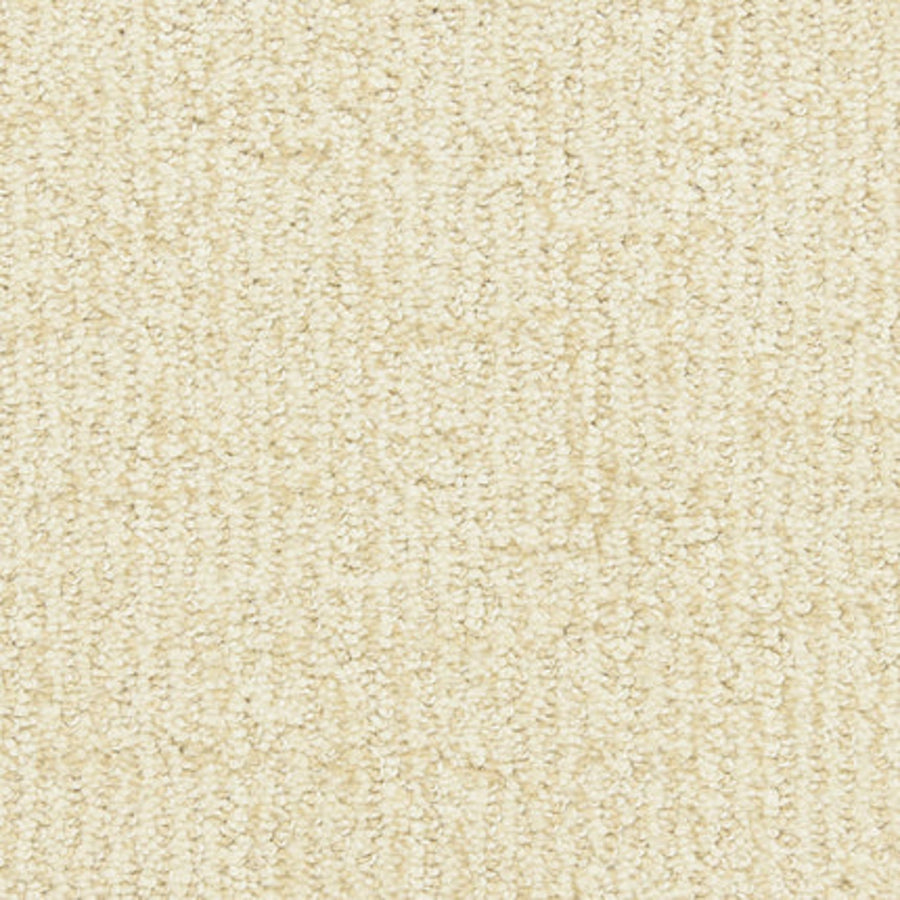 Close-up of Victor Family Friendly Carpet in Adore. This light beige, soft looped pile features tightly woven fibers for a plush, uniform surface—an ideal and durable carpet choice for any home.