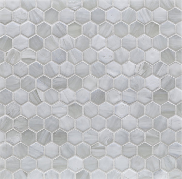The Agate Hexagon Mosaic Glass Tile features white and light gray hexagons in a honeycomb pattern, offering a modern geometric surface design.