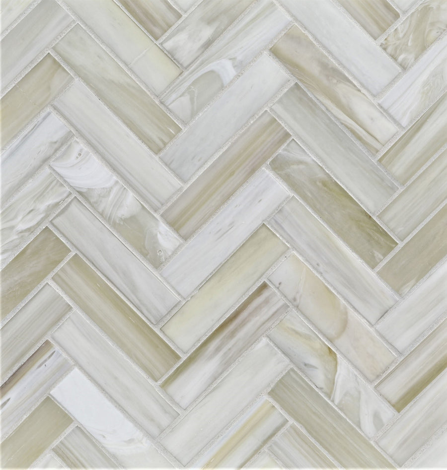 The Agate 1x4 Herringbone Asolo Mosaic Glass Tile features rectangular, glossy glass tiles in a herringbone pattern with white, beige, and light gray marbled shades for a sophisticated look.