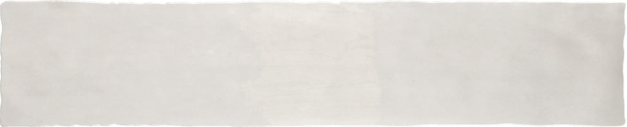 Aire 2x10 Glazed Ceramic Subway Tile features a light gray finish, textured surface with rough edges, and a subtle center gradient, evoking the look of handcrafted ceramic strips.