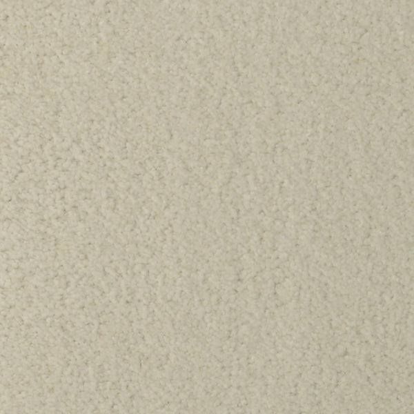 Close-up view of Seduction On Trend Carpet in Alabaster. Its plush texture features uniform fibers and tiny loops, highlighting the cozy yet durable qualities of this premium carpet.