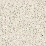 A close-up of the Marble Sill 6x72 in Alabaster reveals a light beige surface accented with small, irregular gray specks, creating a terrazzo-like pattern; its polished edge enhances its refined appearance, reminiscent of natural marble.
