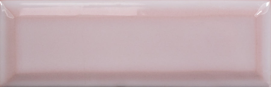 The Alchemist Bevel 2" x 6" Subway Tile in Primrose is a rectangular, glossy ceramic tile with a beveled edge and smooth surface.