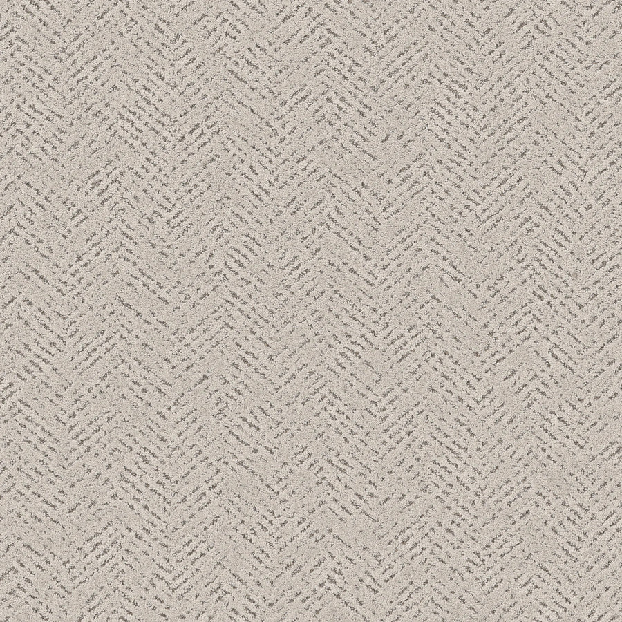 Close-up of Favoured Path Pet Friendly flooring in Almond Silk, featuring a light beige herringbone texture. Its woven, fabric-like look adds contemporary style and is ideal for modern spaces.
