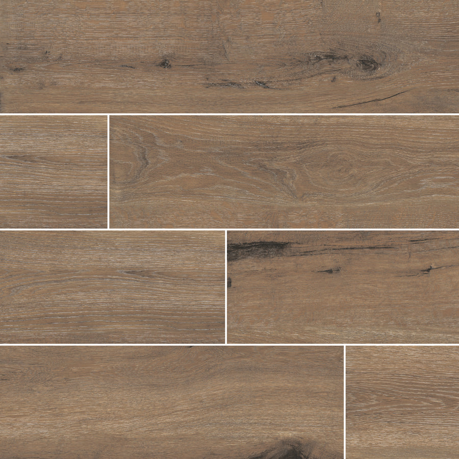 Antonius 6x36 Porcelain Tile, arranged in a staggered pattern, features a natural brown wood look with visible grain and knots for a rustic, textured appearance.
