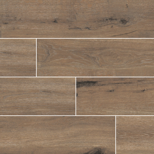 Antonius 6x36 Porcelain Tile, arranged in a staggered pattern, features a natural brown wood look with visible grain and knots for a rustic, textured appearance.