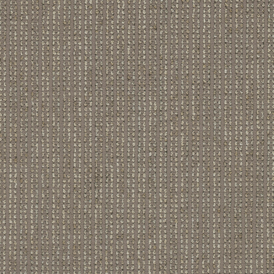 Close-up of Appealing Berber Carpet, featuring a taupe background with small, light-colored dots in vertical rows. The woven texture adds a subtle, elegant look reminiscent of classic Berber carpet patterns.