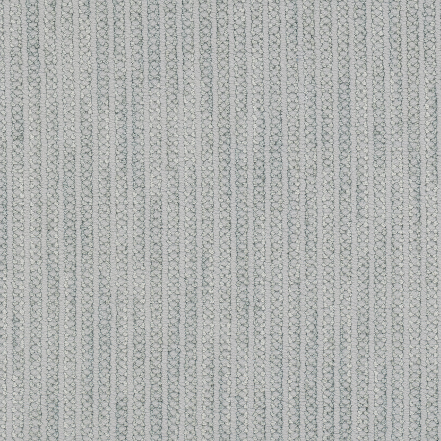 Close-up of Appealing Berber Carpet reveals vertical rows of tightly woven, light gray threads, forming a subtle striped pattern and soft texture, characteristic of high-quality Berber carpeting.