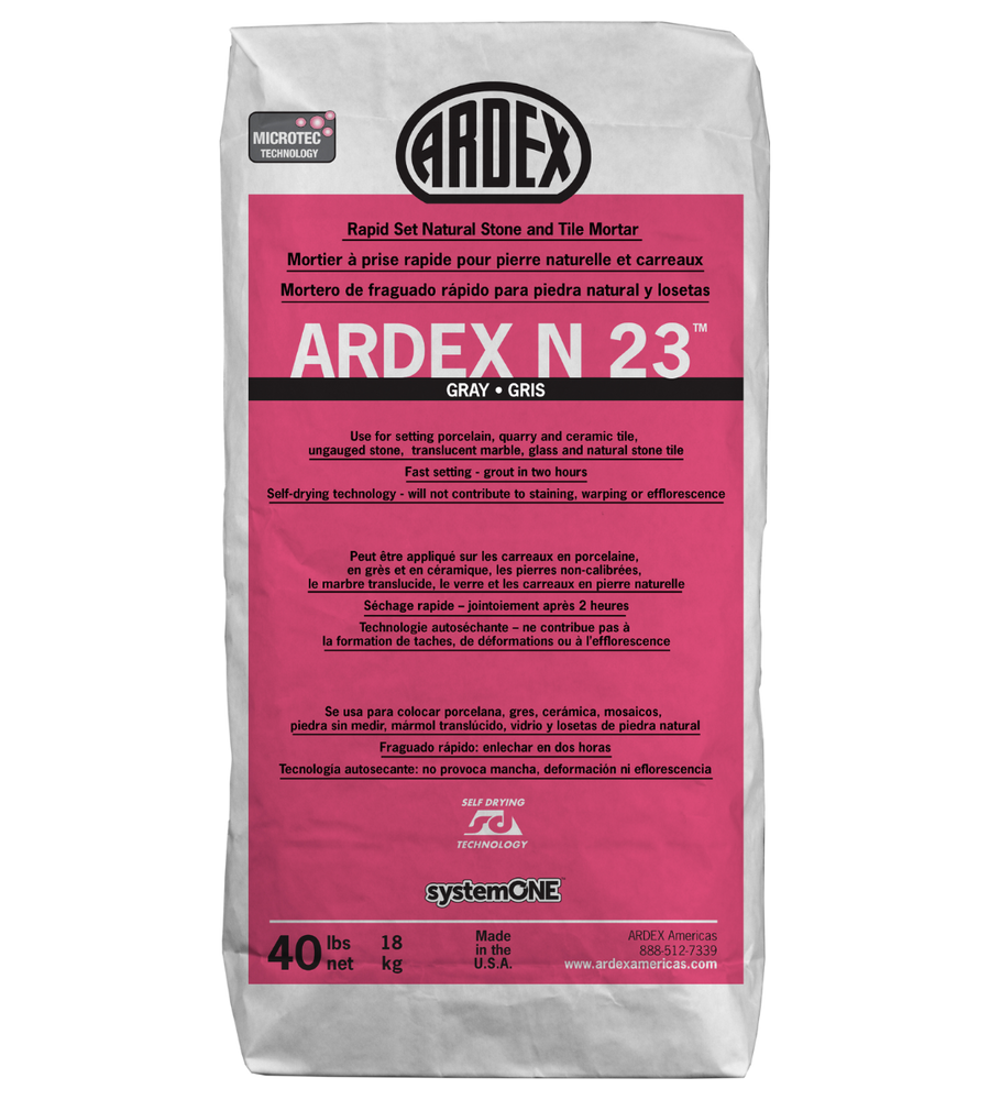 A 40 lb bag of Ardex N 23 Gray rapid-setting mortar for moisture-sensitive natural stone and tile. The white bag displays red and gray labels with product information in English, French, and Spanish.