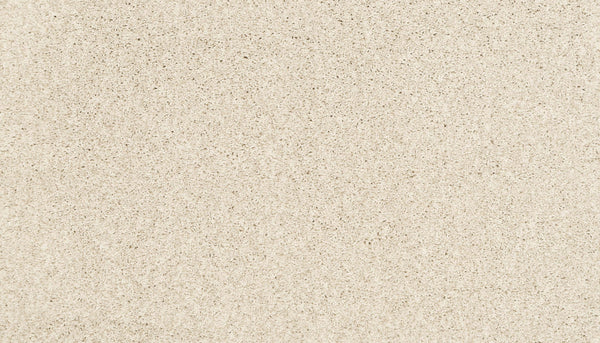 Close-up view of the Artisan Elements Family Friendly Carpet in Creamer. Its smooth, fine, uniform grains resemble soft beach sand, making it perfect for high-traffic areas with comfort and subtle natural color variations.