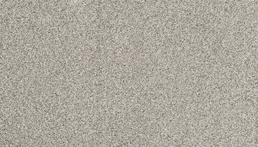 Close-up view of densely packed, fine, light Greenwich fibers on the Artisan Elements Family Friendly Carpet, creating a uniform and textured surface ideal for high-traffic areas.