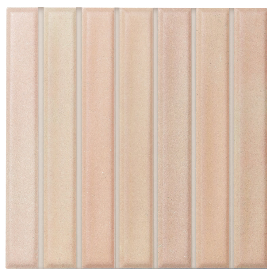 The Astria 4.6" x 4.6" Deco Ceramic Tile in Biscuit Matte features seven vertical raised stripes in soft beige and peach tones, ideal for backsplashes or accent walls with its elegant, matte finish.