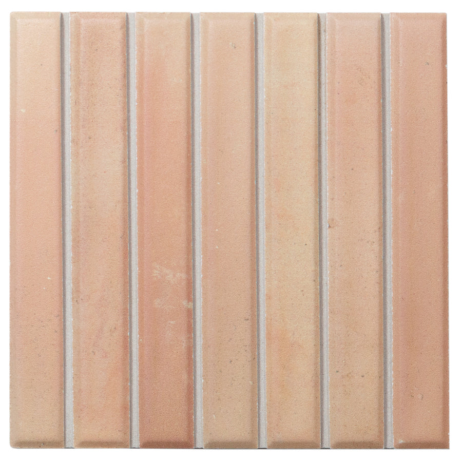 Astria 4.6" x 4.6" Deco Ceramic Tile in Tan Matte features rectangular, vertically arranged tiles with slim grout lines, creating a clean, uniform look ideal for modern backsplashes or accent walls.